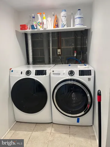 a view of a washer and dryer in a utility room