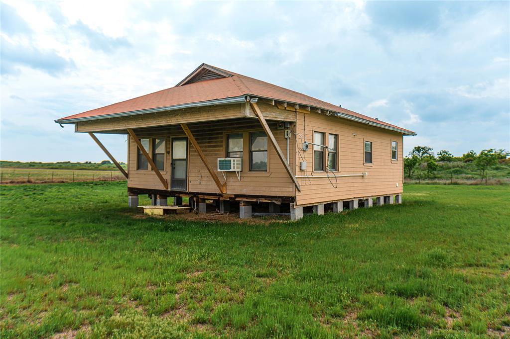 183 Rising Star Tx 76471 Rising Star, TX 76471 - Photo 3 of 19 a view of a house with a yard