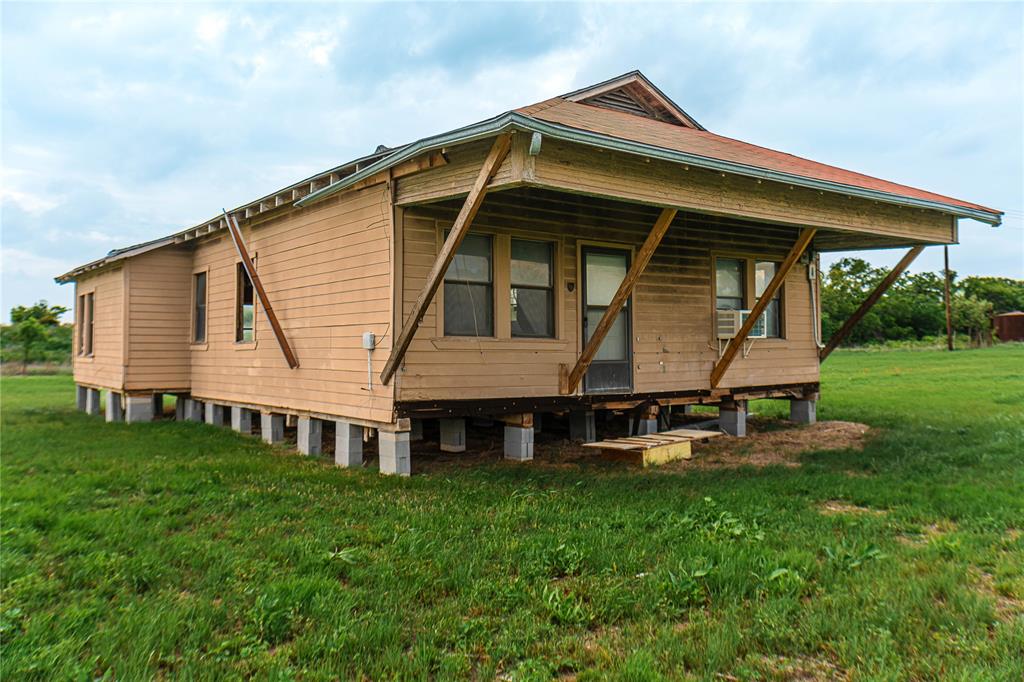 183 Rising Star Tx 76471 Rising Star, TX 76471 - Photo 8 of 19 a view of house with a yard and sitting area