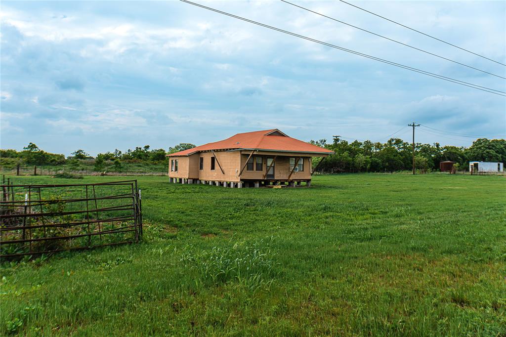 183 Rising Star Tx 76471 Rising Star, TX 76471 - Photo 10 of 19 a view of a house with a yard