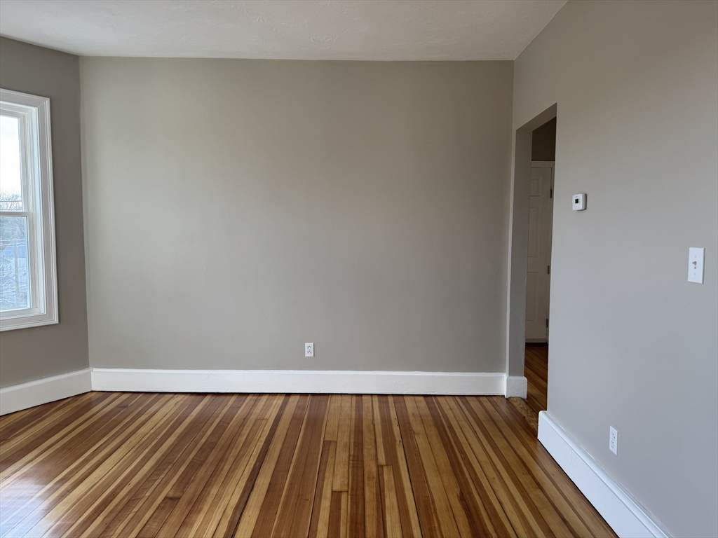 630 Metropolitan Avenue, Unit 3 Boston, MA 02136 - Photo 16 of 31 a view of wooden floor
