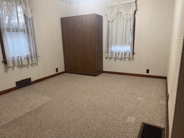 307 North Linden Street Clinton, IL 61727 - Photo 23 of 50 a view of an empty room with a window