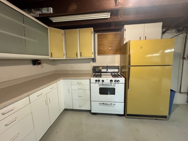 307 North Linden Street Clinton, IL 61727 - Photo 47 of 50 a white refrigerator freezer sitting inside of a kitchen