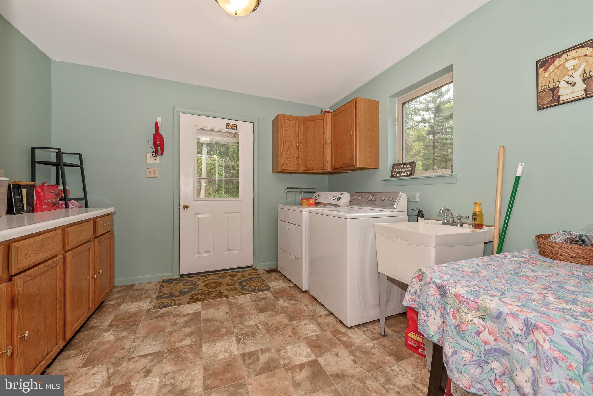 12828 Jesse Smith Road Mount Airy, MD 21771 - Photo 17 of 46 Laundry room with exit to rear yard