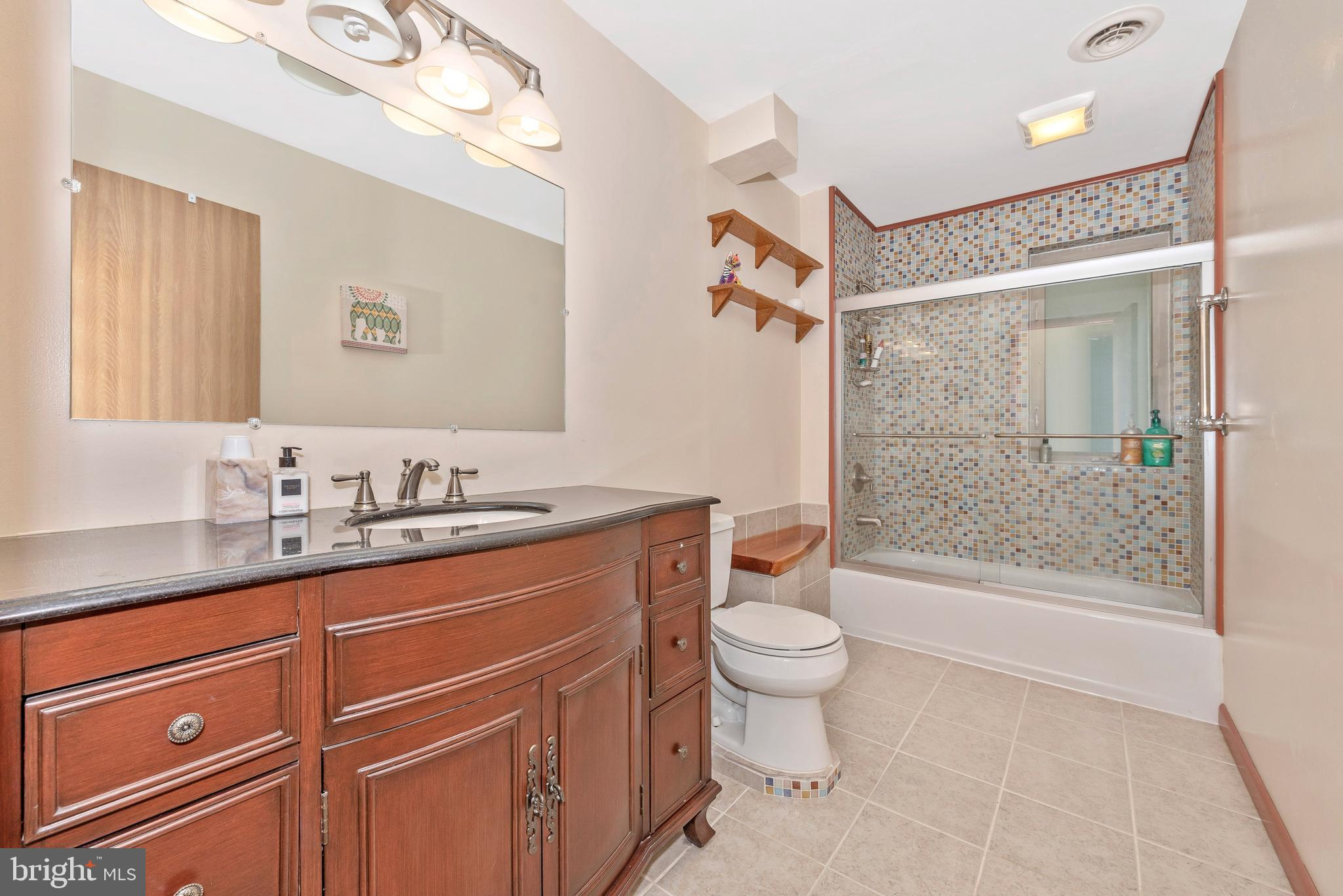 12828 Jesse Smith Road Mount Airy, MD 21771 - Photo 25 of 46 Beautiful hall bath with custom tile