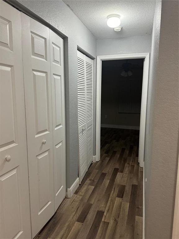 6351 Landings Way Tamarac, FL 33321 - Photo 10 of 16 a view of a hallway with wooden floor and closet