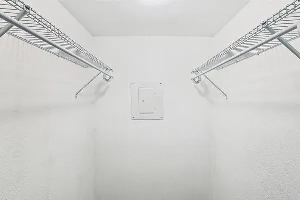 a view of small space with racks on the wall