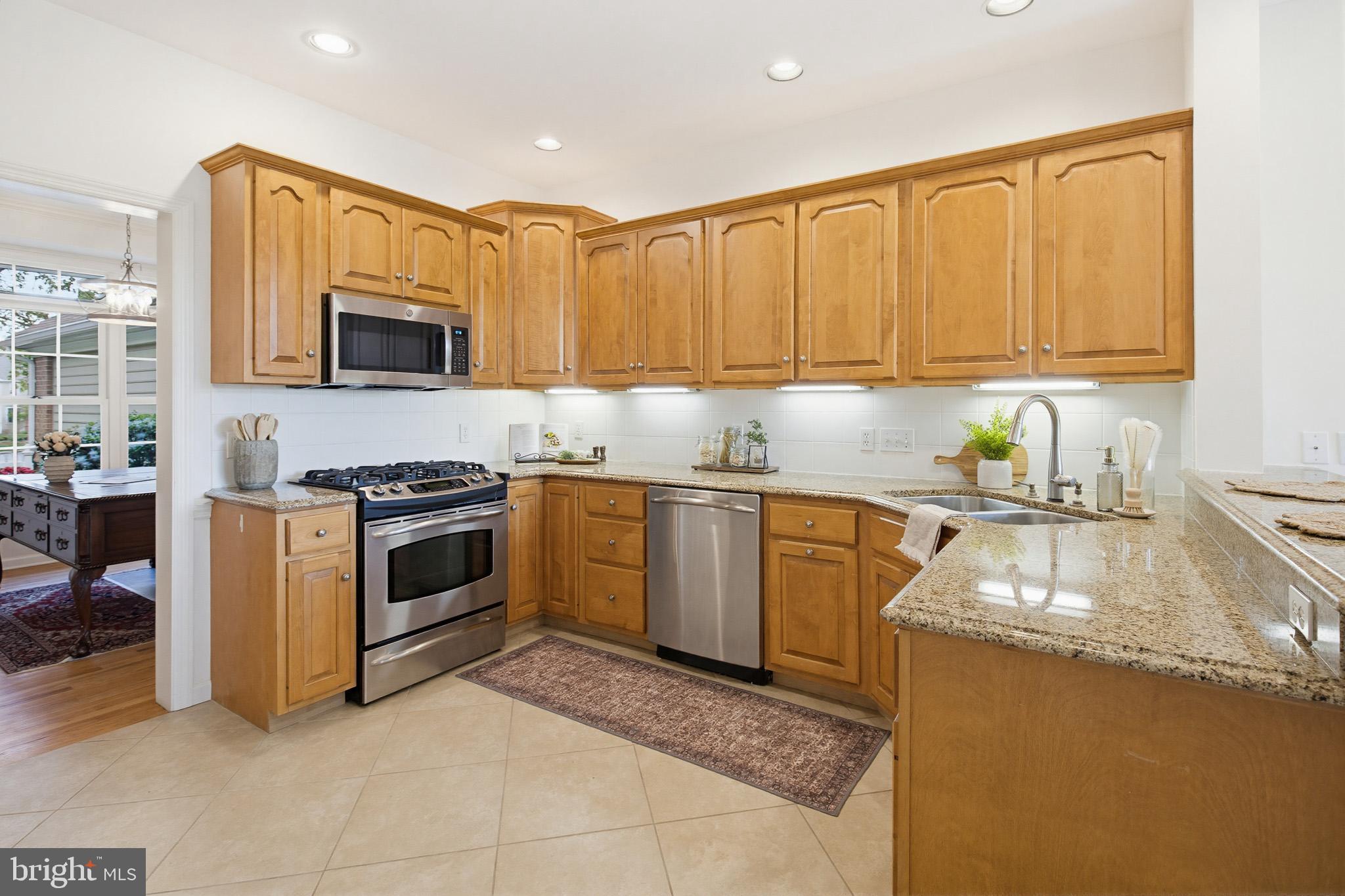 634 Northfield Road Lititz, PA 17543 - Photo 16 of 45 a kitchen with a sink stove and microwave