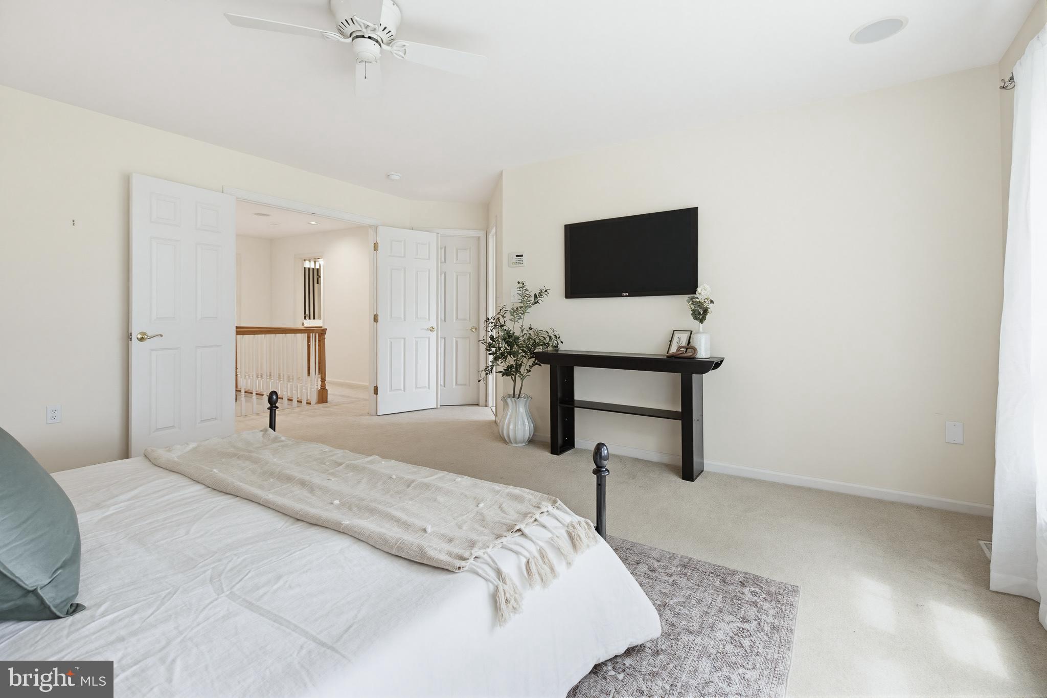 634 Northfield Road Lititz, PA 17543 - Photo 29 of 45 a bedroom with a bed and a flat screen tv