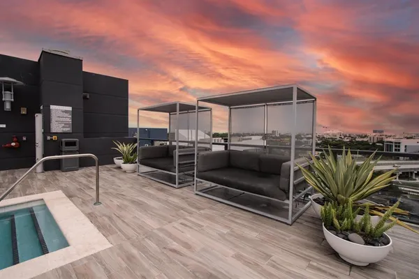 a living room with furniture and a table