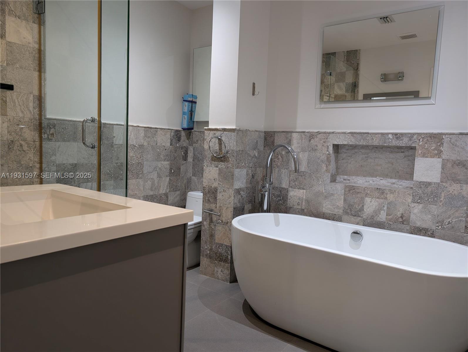6061 Collins Avenue, Unit 4E Miami Beach, FL 33140 - Photo 9 of 12 master bath