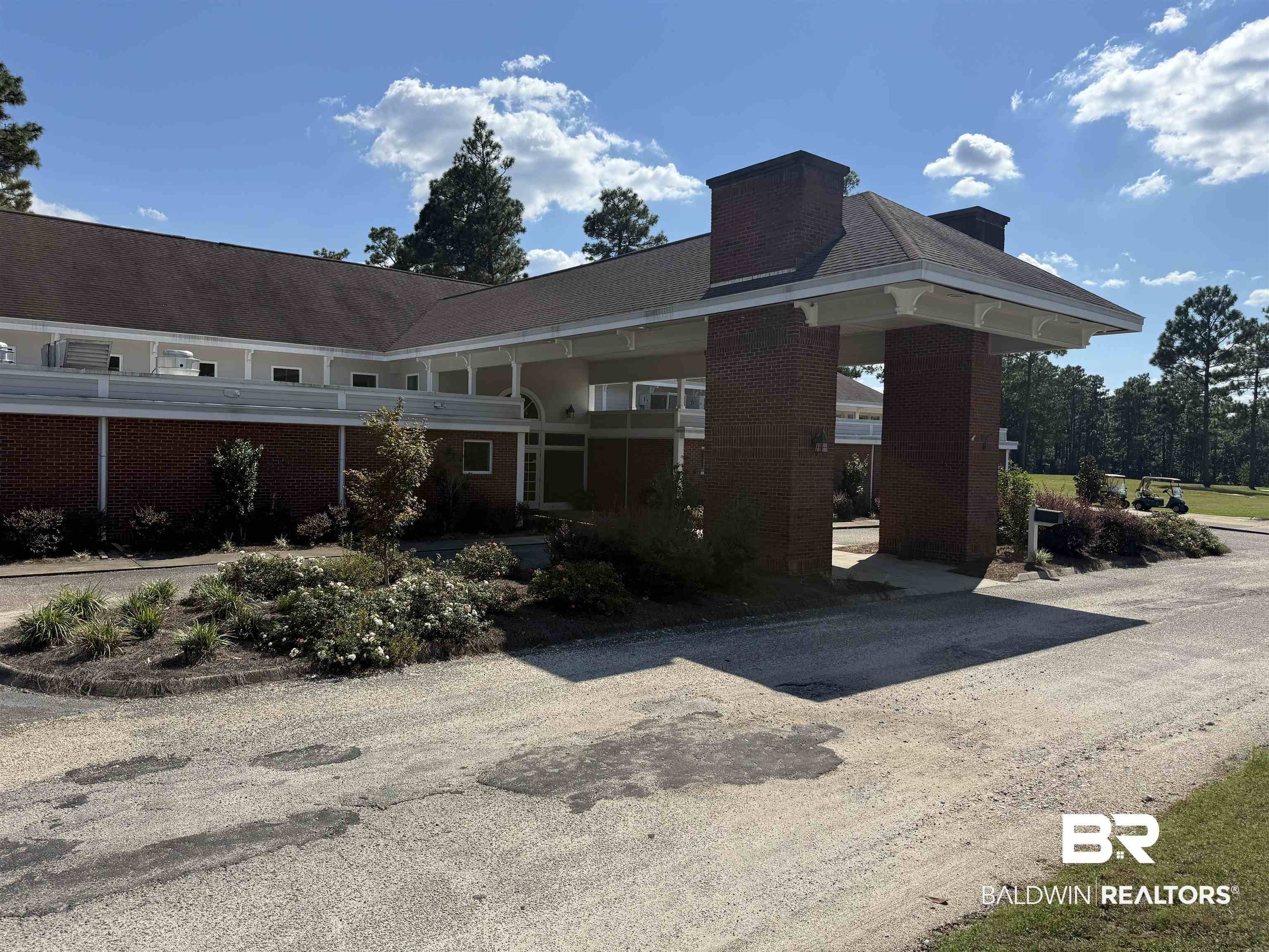 415 Juniper Creek Road Brewton, AL 36426 - Photo 22 of 35 View of front facade featuring brick siding and a chimney