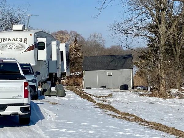 a view of a street with cars