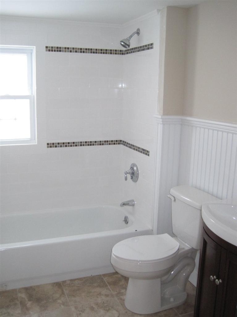 126 Old Town Road Hyannis, MA 02601 - Photo 11 of 13 a bathroom with a toilet and a bathtub