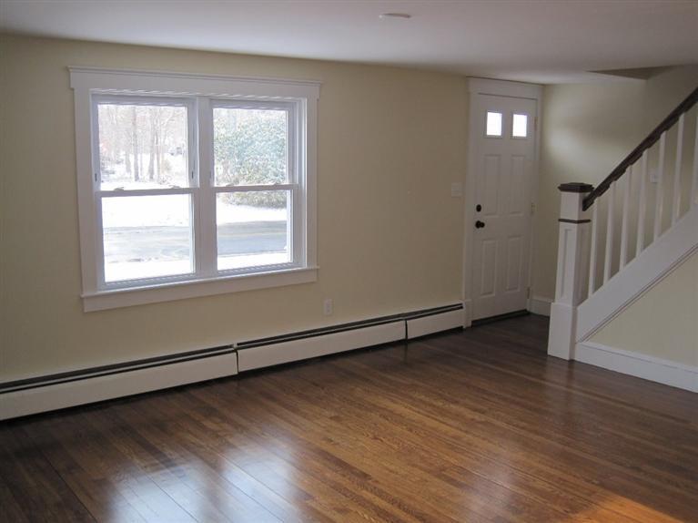 126 Old Town Road Hyannis, MA 02601 - Photo 4 of 13 a view of an empty room with wooden floor and a window