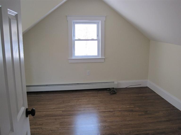 126 Old Town Road Hyannis, MA 02601 - Photo 8 of 13 a view of a small space with wooden floor and a window
