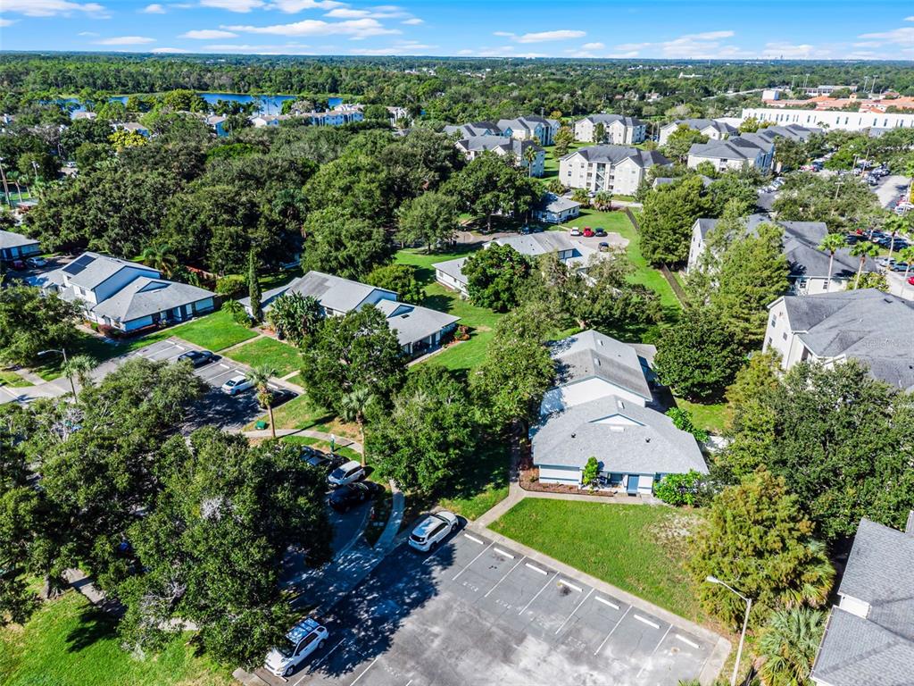 2722 Graduate Court Orlando, FL 32826 - Photo 29 of 33 an aerial view of a house with a yard