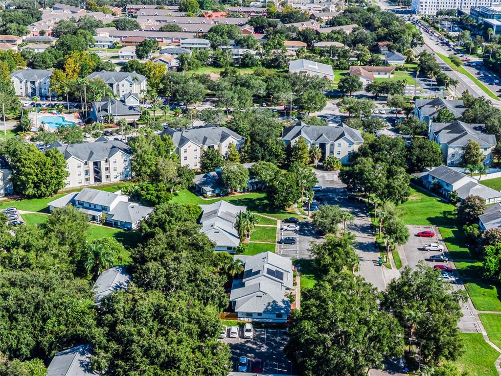 2722 Graduate Court Orlando, FL 32826 - Photo 31 of 33 an aerial view of residential houses with outdoor space and trees