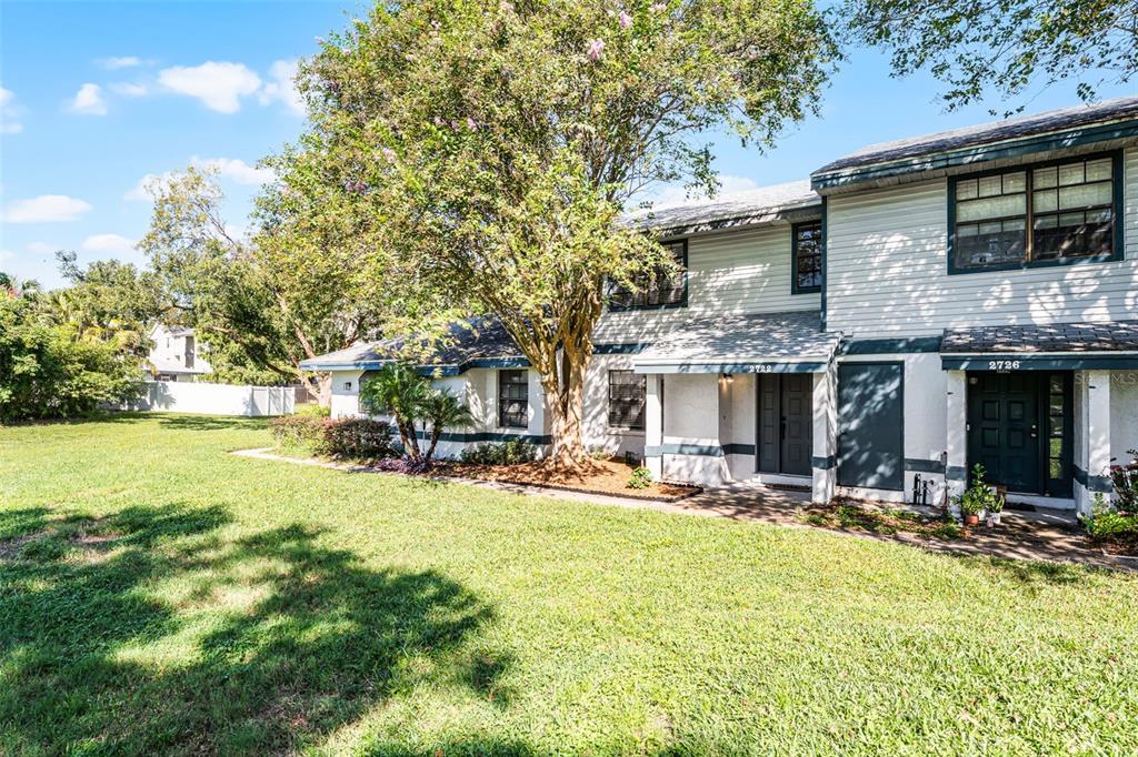 2722 Graduate Court Orlando, FL 32826 - Photo 4 of 33 a view of a house with swimming pool and sitting area
