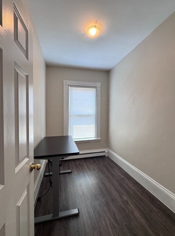 401 Washington Street, Unit 3 Cambridge, MA 02139 - Photo 5 of 13 wooden floor in an empty room with a window