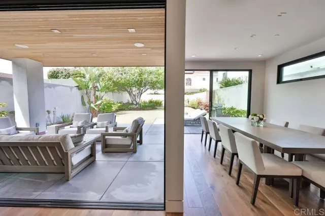 a view of a balcony with furniture