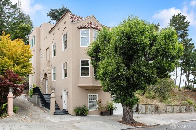 a front view of a white building