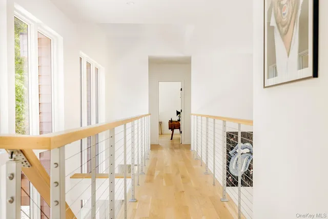 a bedroom with bed and a window