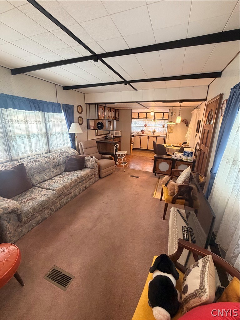 1275 State Route, Unit 27 Elbridge, NY 13060 - Photo 3 of 13 Open living room, dining and kitchen