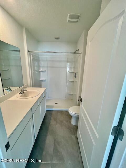 73 Hidden Mdws Road St. Augustine, FL 32095 - Photo 18 of 25 a bathroom with a sink a toilet and a shower