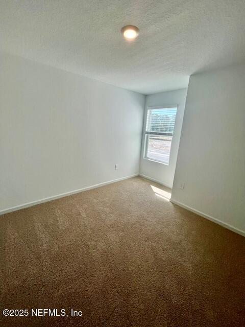 73 Hidden Mdws Road St. Augustine, FL 32095 - Photo 20 of 25 an empty room with a window