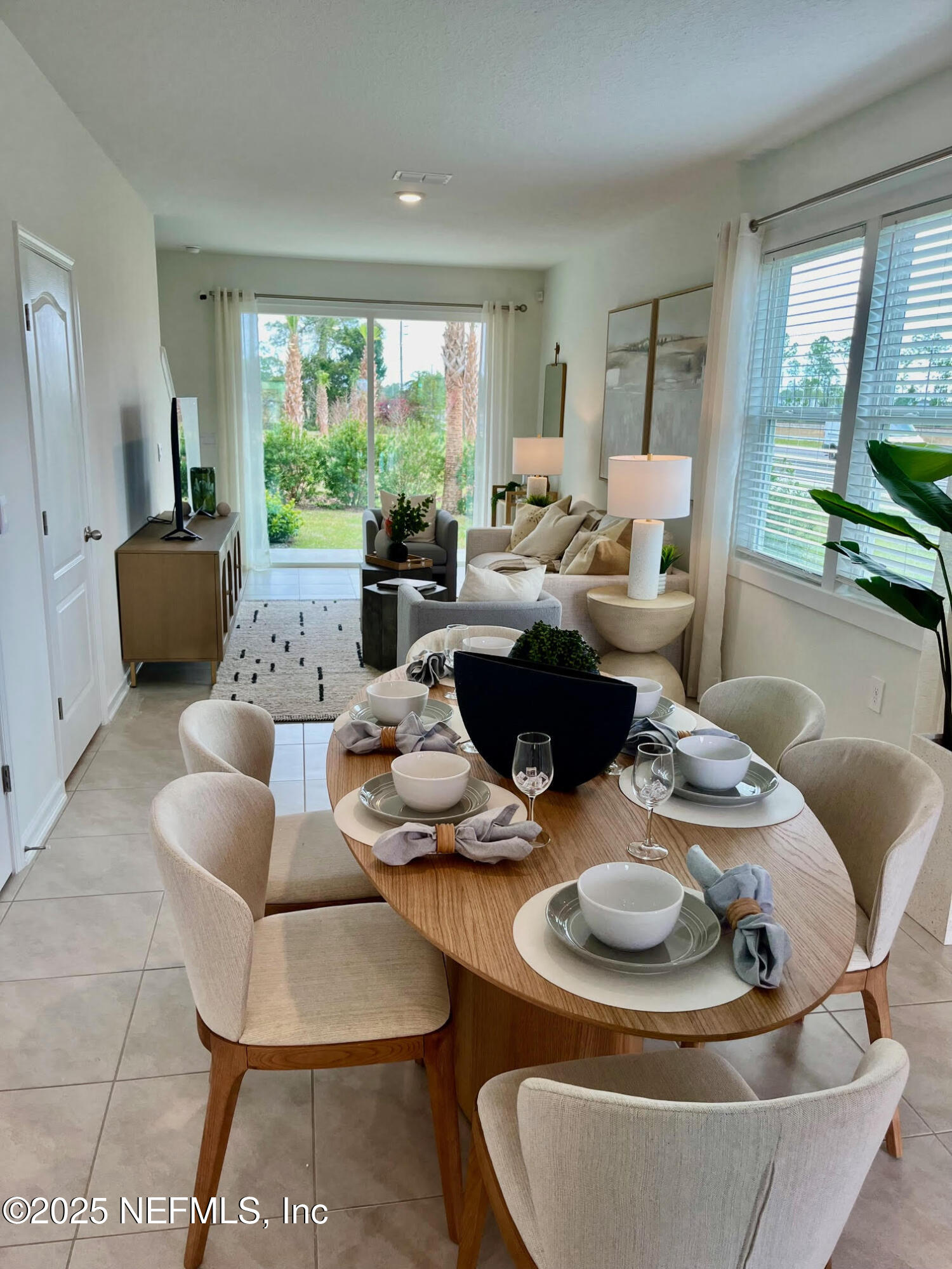 73 Hidden Mdws Road St. Augustine, FL 32095 - Photo 5 of 25 a living room with furniture and a large window