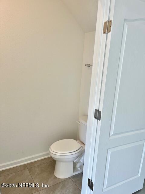 73 Hidden Mdws Road St. Augustine, FL 32095 - Photo 8 of 25 a white toilet sitting next to a shower