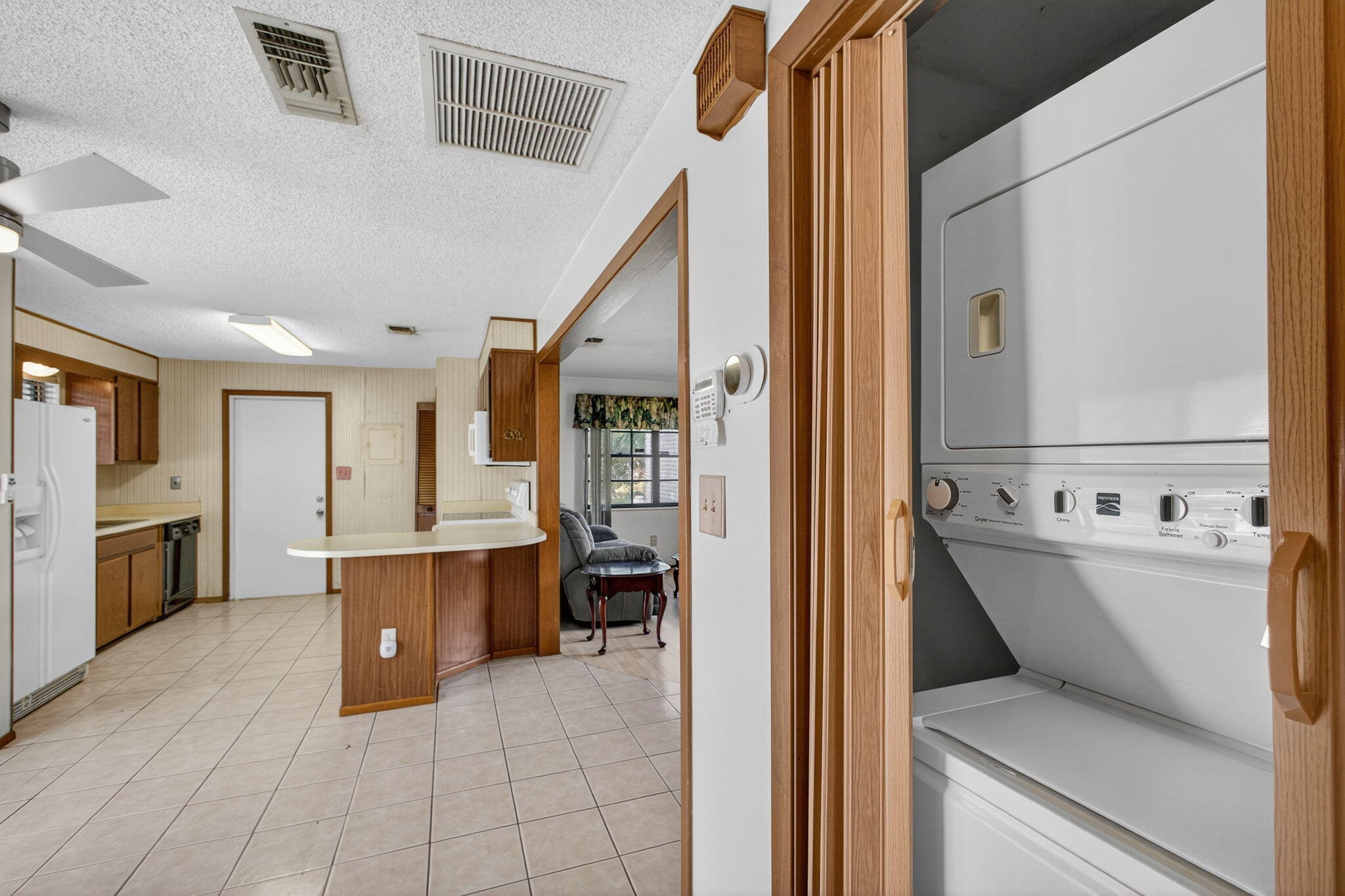 1332 West 33rd Street Riviera Beach, FL 33404 - Photo 14 of 25 a view of kitchen with furniture and wooden floor
