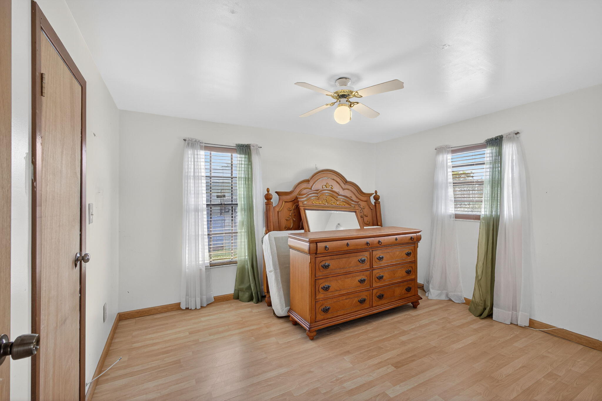 1332 West 33rd Street Riviera Beach, FL 33404 - Photo 18 of 25 a room with bed and window