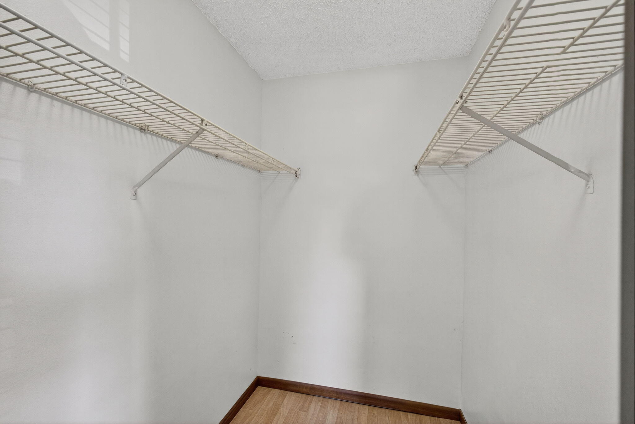 1332 West 33rd Street Riviera Beach, FL 33404 - Photo 19 of 25 a view of a room with racks on the wall
