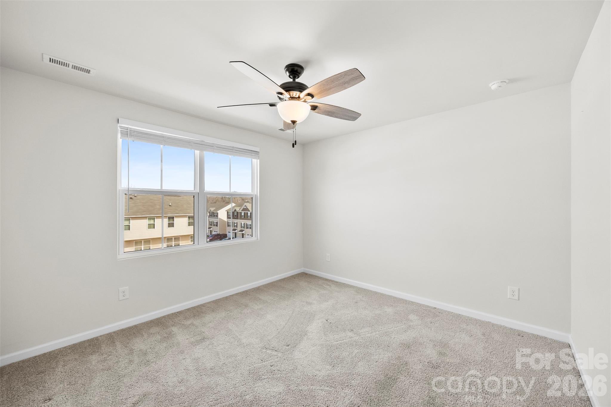 708 Dillon Way Fort Mill, SC 29715 - Photo 13 of 26 a view of an empty room with a window
