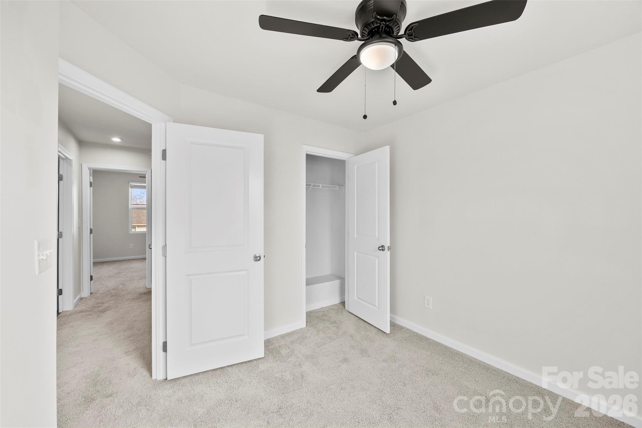 708 Dillon Way Fort Mill, SC 29715 - Photo 24 of 26 an empty room with chandelier fan