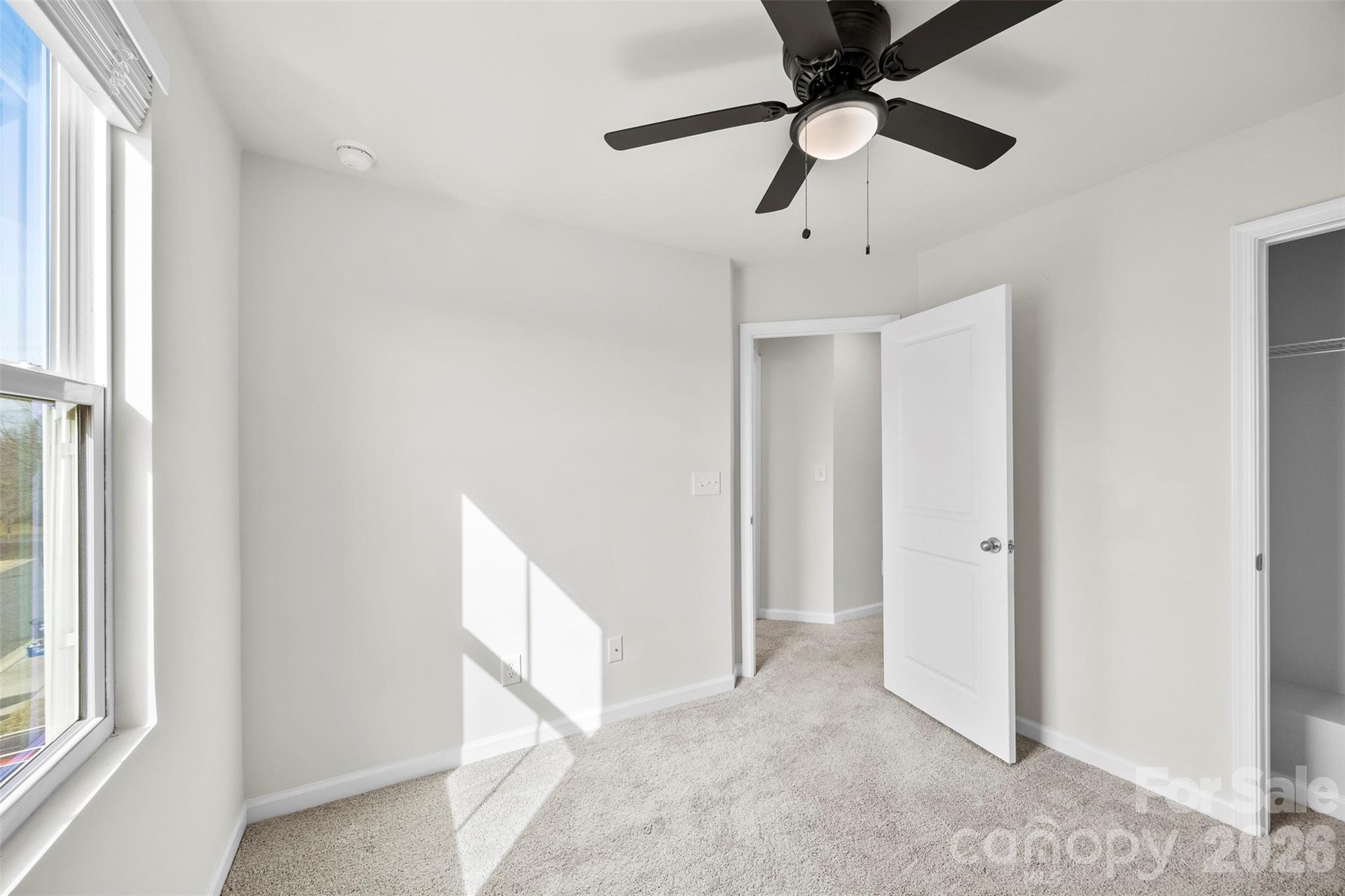 708 Dillon Way Fort Mill, SC 29715 - Photo 25 of 26 a view of an empty room with a window