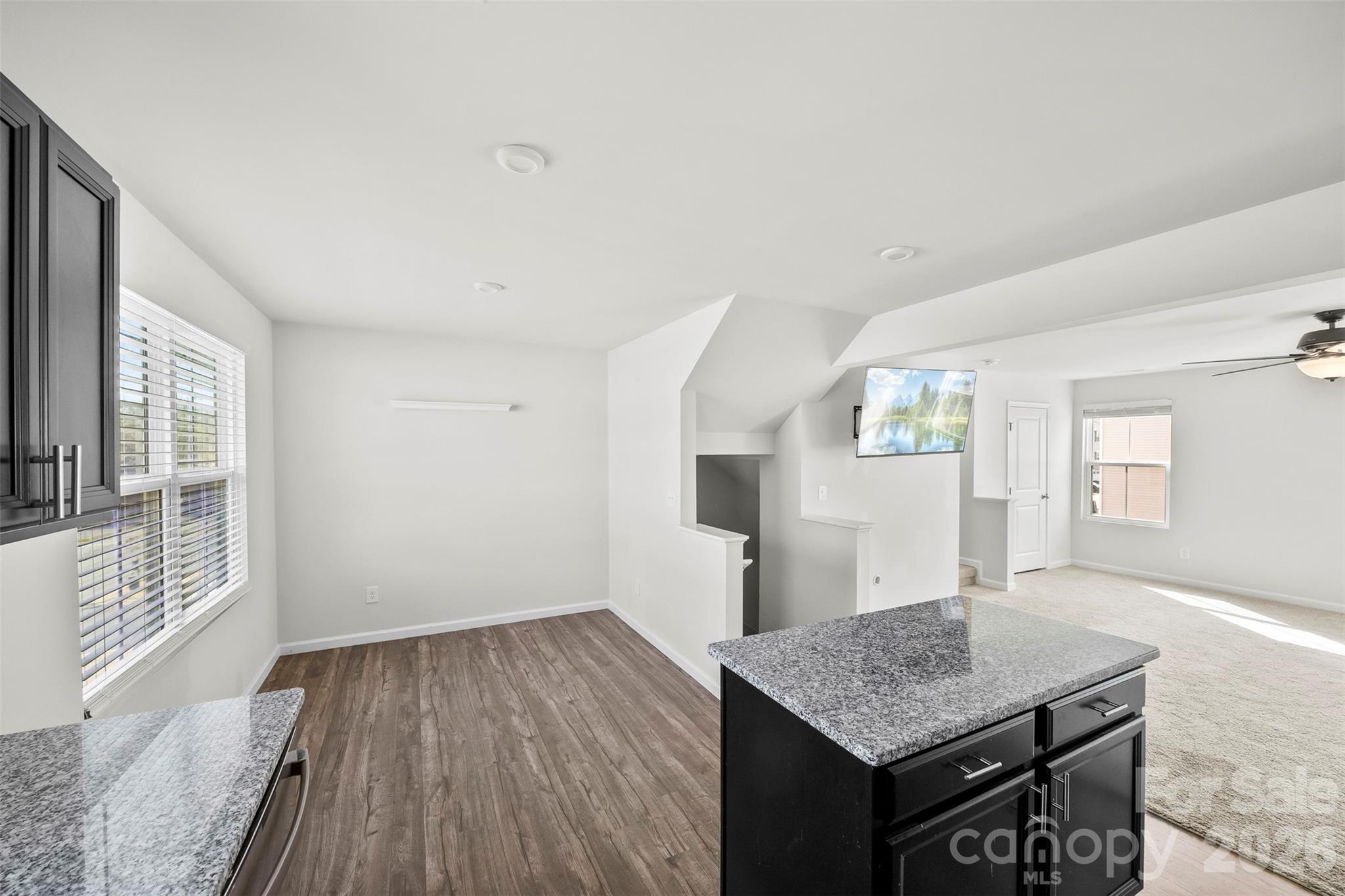708 Dillon Way Fort Mill, SC 29715 - Photo 8 of 26 a view of a kitchen and an empty room