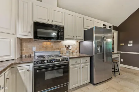 $899,900 | 8208 Aberloch Court, Raleigh, NC 27606