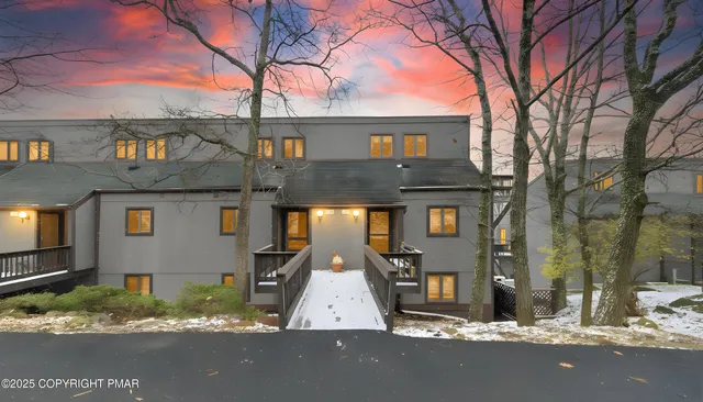 front view of a house with a street