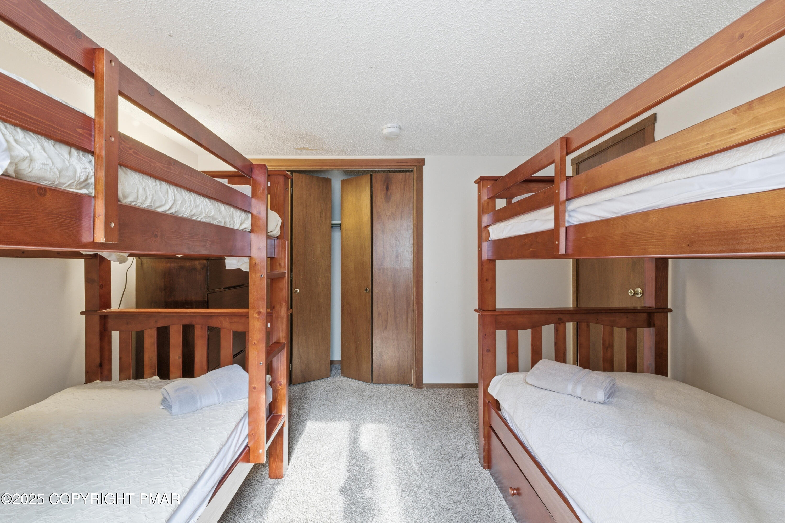 182 Upper Village Way Tannersville, PA 18372 - Photo 24 of 67 a bedroom with a bed and a flat screen tv