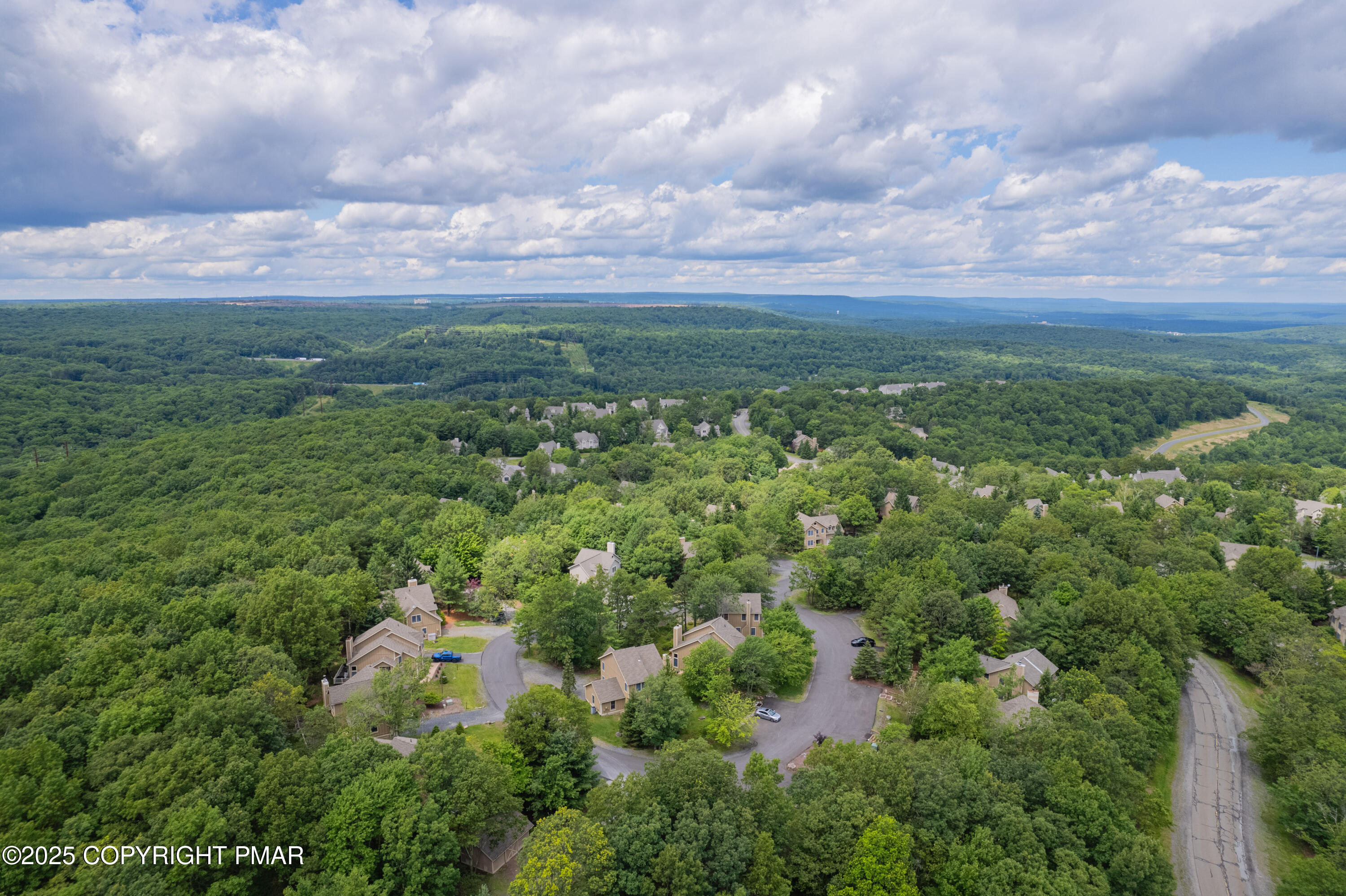 182 Upper Village Way Tannersville, PA 18372 - Photo 42 of 67 an aerial view of residential houses with outdoor space and trees