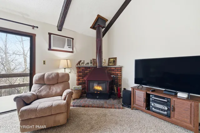 a kitchen with stainless steel appliances a sink cabinets and a refrigerator