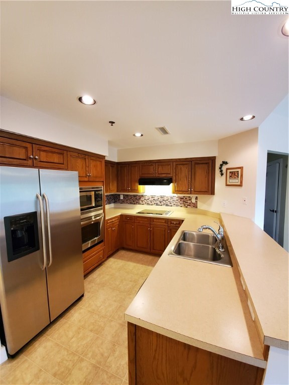 143 Sports Club Lane, Unit 221 Boone, NC 28607 - Photo 3 of 14 a kitchen with refrigerator and car