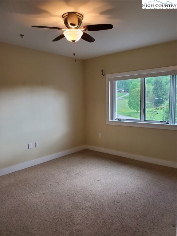 143 Sports Club Lane, Unit 221 Boone, NC 28607 - Photo 4 of 14 an empty room with a window
