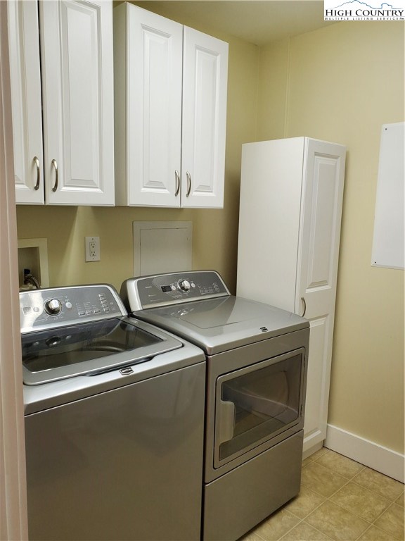 143 Sports Club Lane, Unit 221 Boone, NC 28607 - Photo 9 of 14 a utility room with dryer and washer