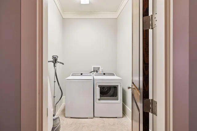 a bedroom with furniture and wooden floor
