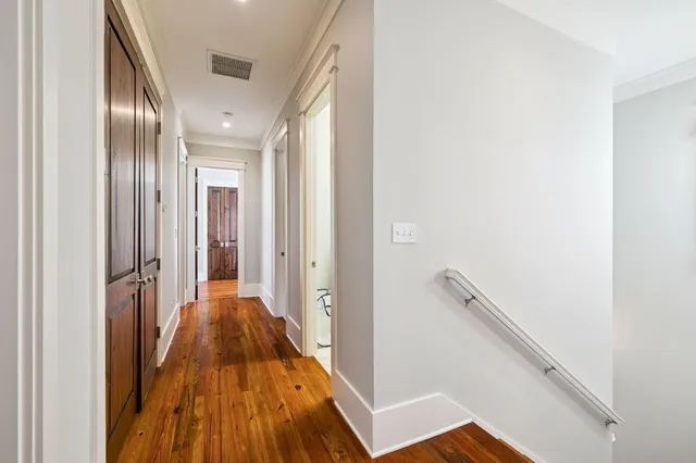 a view of a balcony with wooden floor