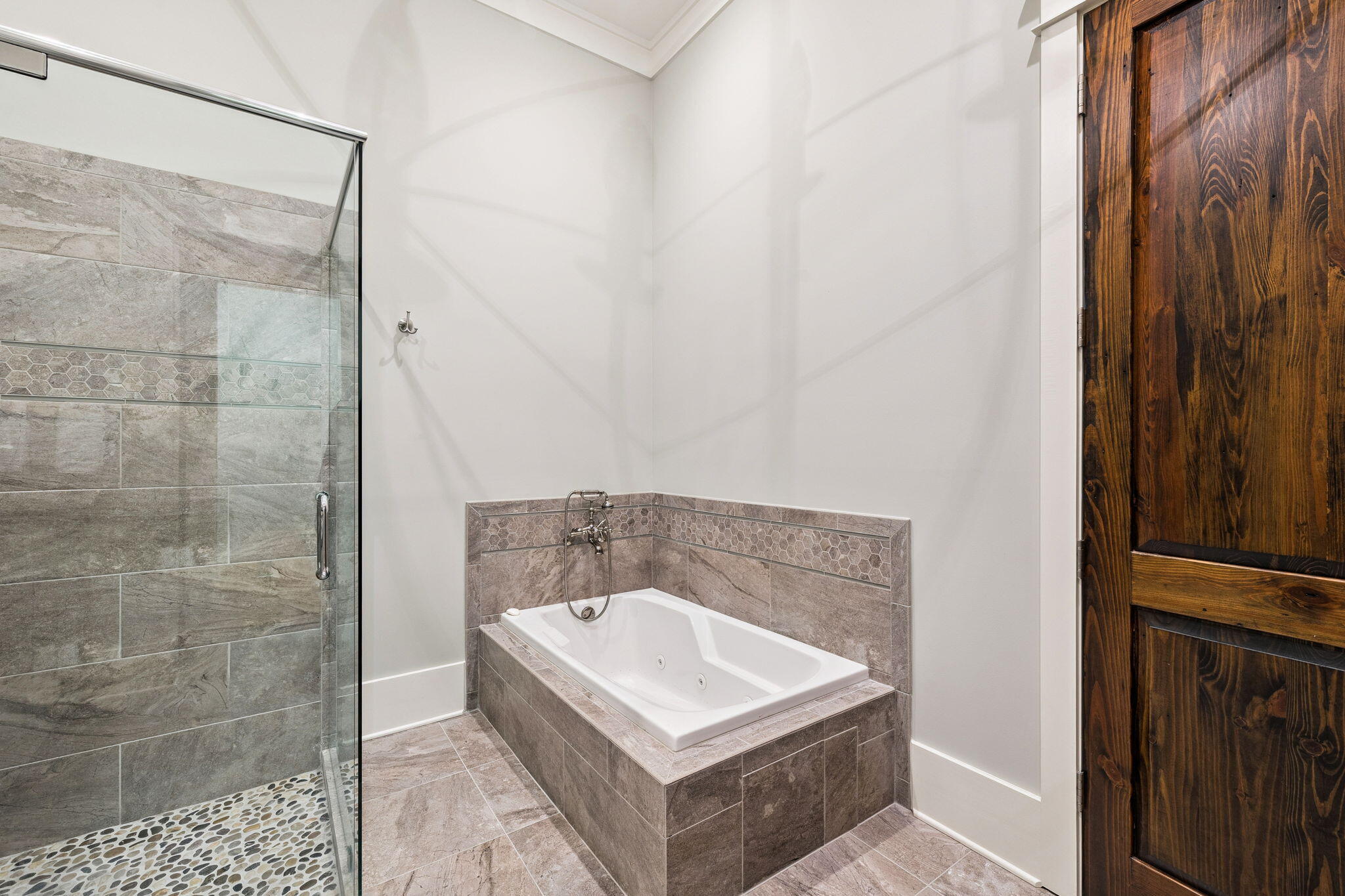 69 Bennett Santa Rosa Beach, FL 32459 - Photo 26 of 58 a bathroom with a bathtub and shower